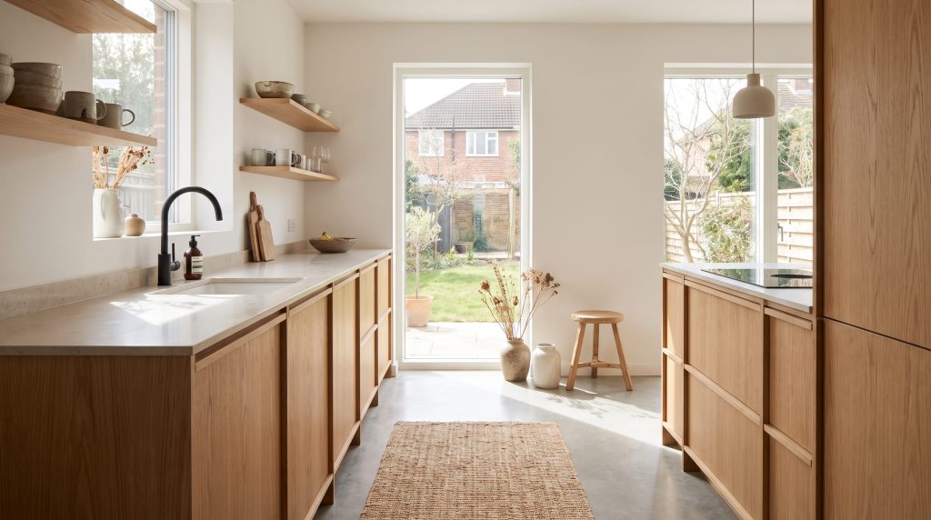 Scandinavian kitchen design idea with light oak cabinets